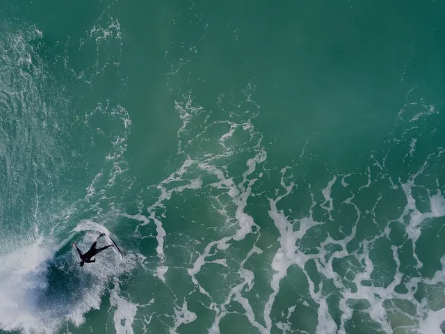 Mike Smith is a pretty sweet boss, he owns the clothing company RPM, any hint of this wave being on he'll round the staff up for a quick strike over in the boat.