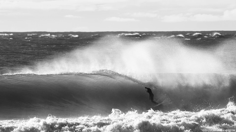 Alex Dive on his first wave for the morning. Unfortunately it claimed his board as well, unlucky. Photo: Jereme Aubertin