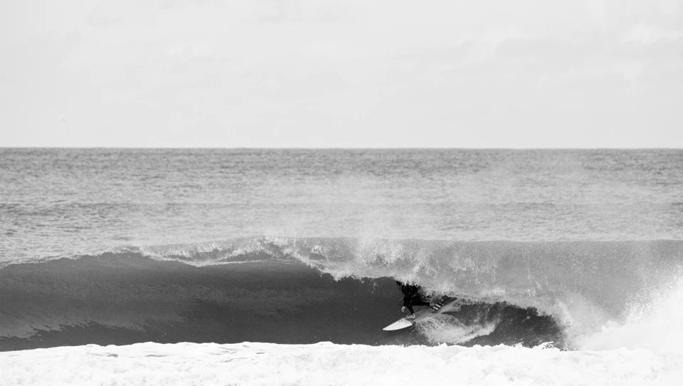 Sam Haven shootin' the curl at his Auckland home beach. Photo: Jereme Aubertin